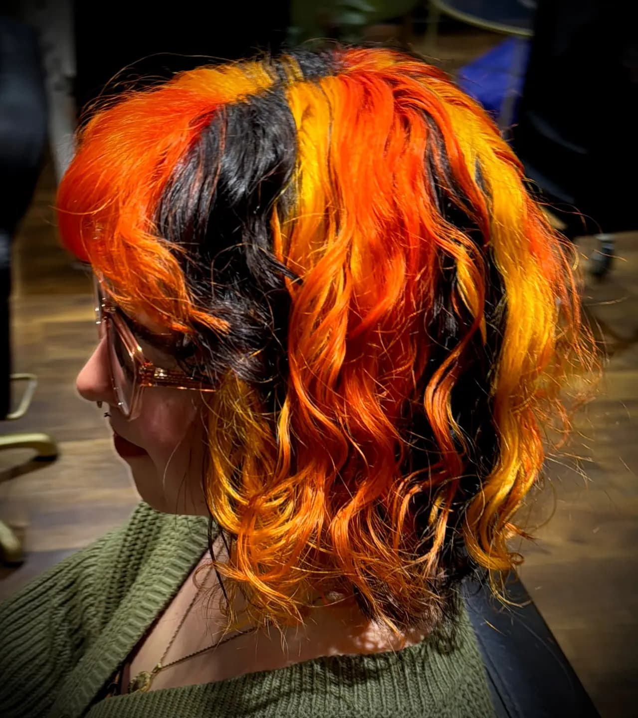 Calico in orange and black on curly hair